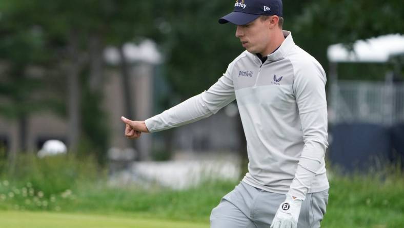 Jun 19, 2022; Brookline, Massachusetts, USA; Matt Fitzpatrick acknowledges the crowd during the final round of the U.S. Open golf tournament. Mandatory Credit: John David Mercer-USA TODAY Sports