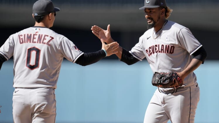 Jun 19, 2022; Los Angeles, California, USA; Cleveland Guardians relief pitcher Emmanuel Clase (48) celebrates with second baseman Andres Gimenez (0) after the game against the Los Angeles Dodgers at Dodger Stadium. Mandatory Credit: Kirby Lee-USA TODAY Sports