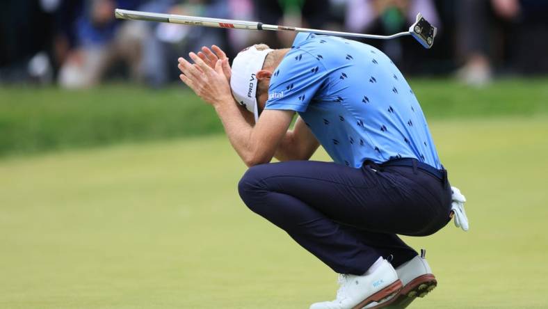 Jun 19, 2022; Brookline, Massachusetts, USA; Will Zalatoris reacts after missing a putt on the 18th green during the final round of the U.S. Open golf tournament. Mandatory Credit: Aaron Doster-USA TODAY Sports