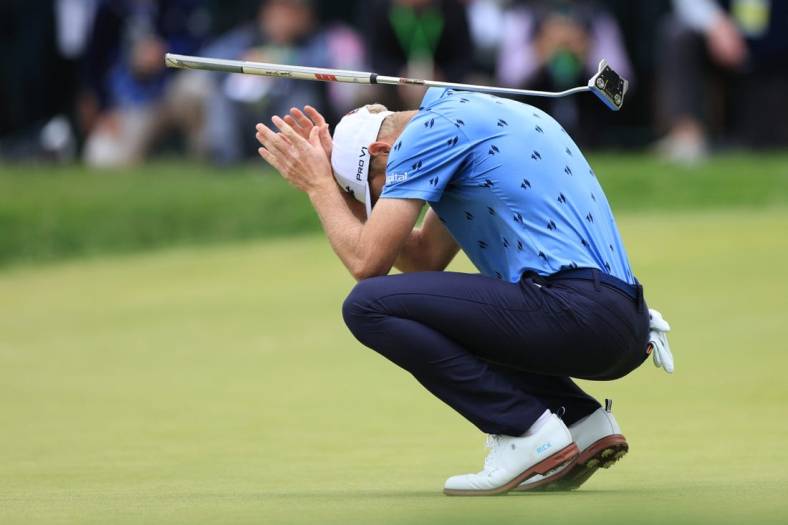 Jun 19, 2022; Brookline, Massachusetts, USA; Will Zalatoris reacts after missing a putt on the 18th green during the final round of the U.S. Open golf tournament. Mandatory Credit: Aaron Doster-USA TODAY Sports