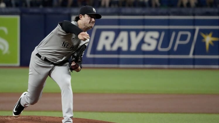 Jun 20, 2022; St. Petersburg, Florida, USA;  New York Yankees starting pitcher Gerrit Cole (45) throws a pitch during the first inning against the Tampa Bay Rays at Tropicana Field. Mandatory Credit: Dave Nelson-USA TODAY Sports