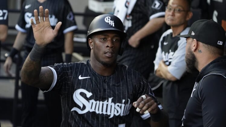 Jun 20, 2022; Chicago, Illinois, USA; Chicago White Sox shortstop Tim Anderson (7) is greeted in the dugout after scoring against the Toronto Blue Jays during the first inning at Guaranteed Rate Field. Mandatory Credit: David Banks-USA TODAY Sports