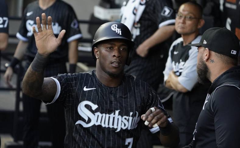 Jun 20, 2022; Chicago, Illinois, USA; Chicago White Sox shortstop Tim Anderson (7) is greeted in the dugout after scoring against the Toronto Blue Jays during the first inning at Guaranteed Rate Field. Mandatory Credit: David Banks-USA TODAY Sports