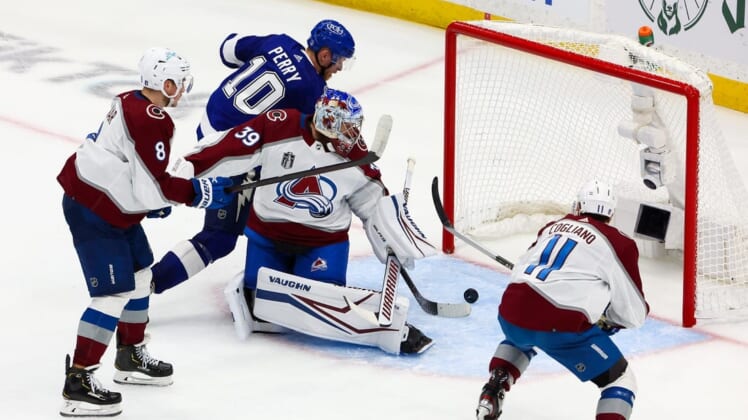 Jun 20, 2022; Tampa, Florida, USA; Tampa Bay Lightning right wing Corey Perry (10) scores against Colorado Avalanche goaltender Pavel Francouz (39) during the second period in game three of the 2022 Stanley Cup Final at Amalie Arena. Mandatory Credit: Mark J. Rebilas-USA TODAY Sports