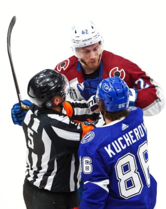 Jun 20, 2022; Tampa, Florida, USA; Colorado Avalanche defenseman Josh Manson (42) and Tampa Bay Lightning right wing Nikita Kucherov (86) exchange words during the second period in game three of the 2022 Stanley Cup Final at Amalie Arena. Mandatory Credit: Mark J. Rebilas-USA TODAY Sports