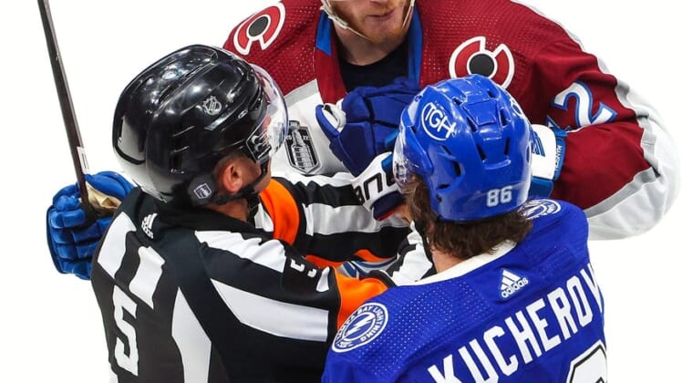 Jun 20, 2022; Tampa, Florida, USA; Colorado Avalanche defenseman Josh Manson (42) and Tampa Bay Lightning right wing Nikita Kucherov (86) exchange words during the second period in game three of the 2022 Stanley Cup Final at Amalie Arena. Mandatory Credit: Mark J. Rebilas-USA TODAY Sports