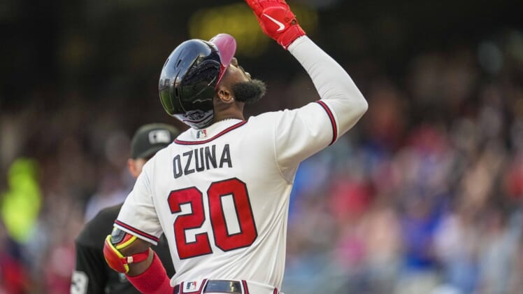 Jun 21, 2022; Cumberland, Georgia, USA; Atlanta Braves designated hitter Marcell Ozuna (20) reacts after hitting a two run home run against the San Francisco Giants during the second inning at Truist Park. Mandatory Credit: Dale Zanine-USA TODAY Sports