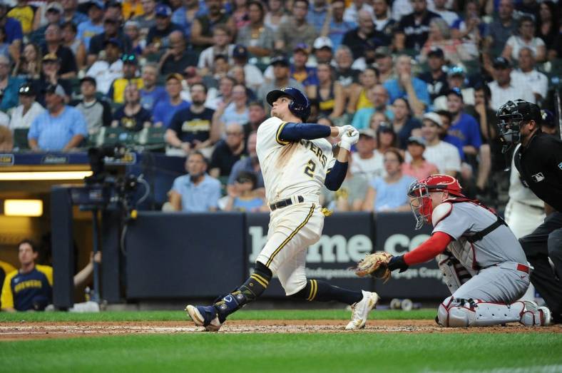 Jun 21, 2022; Milwaukee, Wisconsin, USA; Milwaukee Brewers shortstop Luis Urias (2) flys out in the third inning against the St. Louis Cardinals at American Family Field. Mandatory Credit: Michael McLoone-USA TODAY Sports