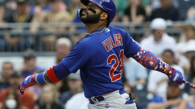 Jun 22, 2022; Pittsburgh, Pennsylvania, USA;  Chicago Cubs second baseman Jonathan Villar (24) hits a double against  the Pittsburgh Pirates during the second inning at PNC Park. Mandatory Credit: Charles LeClaire-USA TODAY Sports