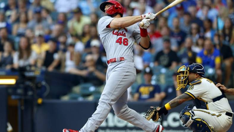 Jun 22, 2022; Milwaukee, Wisconsin, USA;  St. Louis Cardinals first baseman Paul Goldschmidt (46) hits a two run home run during the first inning against the Milwaukee Brewers at American Family Field. Mandatory Credit: Jeff Hanisch-USA TODAY Sports