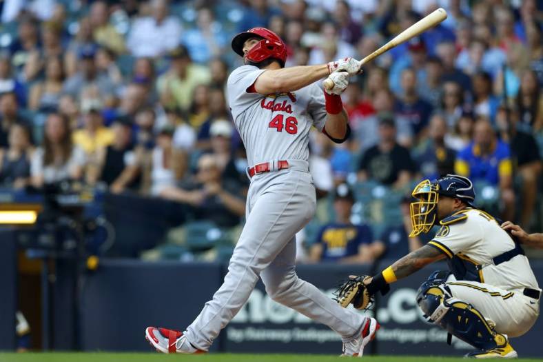 Jun 22, 2022; Milwaukee, Wisconsin, USA;  St. Louis Cardinals first baseman Paul Goldschmidt (46) hits a two run home run during the first inning against the Milwaukee Brewers at American Family Field. Mandatory Credit: Jeff Hanisch-USA TODAY Sports