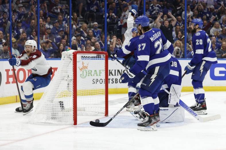 Jun 22, 2022; Tampa, Florida, USA; Colorado Avalanche center Nico Sturm (78) celebrates after a goal by Avalanche center Andrew Cogliano (11) on Tampa Bay Lightning goaltender Andrei Vasilevskiy (88) in the third period in game four of the 2022 Stanley Cup Final at Amalie Arena. Mandatory Credit: Geoff Burke-USA TODAY Sports