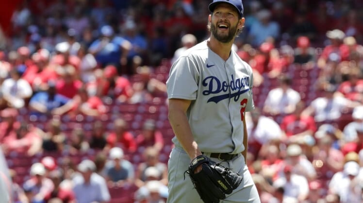 Jun 23, 2022; Cincinnati, Ohio, USA; Los Angeles Dodgers starting pitcher Clayton Kershaw (22) walks off the field during the sixth inning against the Cincinnati Reds at Great American Ball Park. Mandatory Credit: David Kohl-USA TODAY Sports