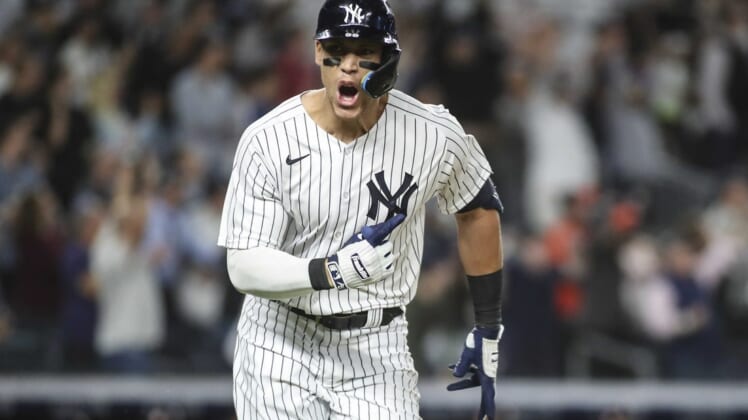 Jun 23, 2022; Bronx, New York, USA;  New York Yankees center fielder Aaron Judge (99) reacts after hitting a game winning RBI single in the ninth inning to defeat the Houston Astros 7-6 at Yankee Stadium. Mandatory Credit: Wendell Cruz-USA TODAY Sports