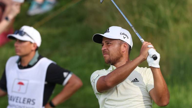 Jun 24, 2022; Cromwell, Connecticut, USA; Xander Schauffele plays a shot from the 17th tee during the second round of the Travelers Championship golf tournament. Mandatory Credit: Vincent Carchietta-USA TODAY Sports