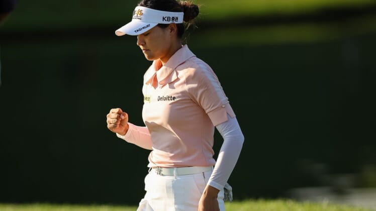 Jun 24, 2022; Bethesda, Maryland, USA; In Gee Chun celebrates after making a putt on the 18th green during the second round of the KPMG Women's PGA Championship golf tournament at Congressional Country Club. Mandatory Credit: Scott Taetsch-USA TODAY Sports