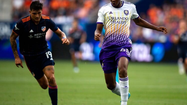 Orlando City defender Thomas Williams (68) dribbles down pitch in the first half of the MLS match between between the FC Cincinnati and the Orlando City at TQL Stadium in Cincinnati on Friday, June 24, 2022.Orlando City At Fc Cincinnati 151