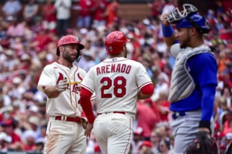 Jun 25, 2022; St. Louis, Missouri, USA;  St. Louis Cardinals first baseman Paul Goldschmidt (46) and third baseman Nolan Arenado (28) celebrate after they both scored against the Chicago Cubs during the first inning at Busch Stadium. Mandatory Credit: Jeff Curry-USA TODAY Sports