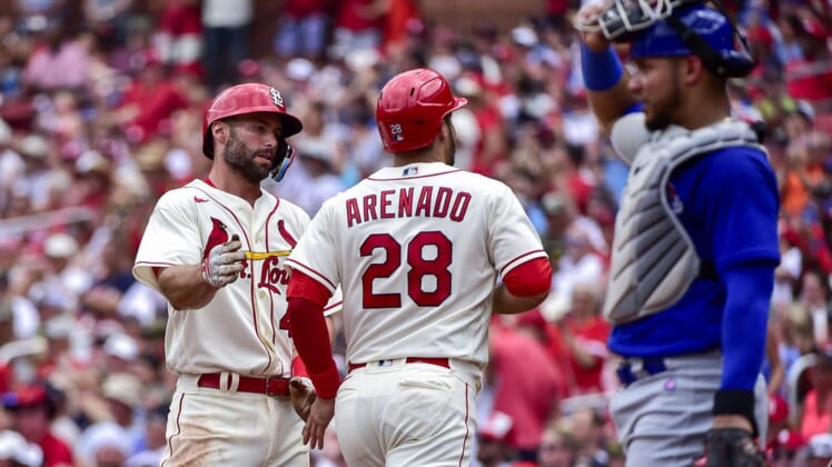 Jun 25, 2022; St. Louis, Missouri, USA;  St. Louis Cardinals first baseman Paul Goldschmidt (46) and third baseman Nolan Arenado (28) celebrate after they both scored against the Chicago Cubs during the first inning at Busch Stadium. Mandatory Credit: Jeff Curry-USA TODAY Sports