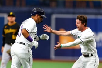 Jun 25, 2022; St. Petersburg, Florida, USA; Tampa Bay Rays center fielder Brett Phillips (35) congratulates shortstop Isaac Paredes (17) after hitting walk off single against the Pittsburgh Pirates in the ninth inning at Tropicana Field. Mandatory Credit: Nathan Ray Seebeck-USA TODAY Sports