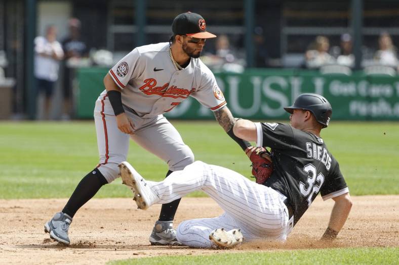 Jun 25, 2022; Chicago, Illinois, USA; Baltimore Orioles second baseman 76 Jonathan Arauz (76) tags out Chicago White Sox designated hitter Gavin Sheets (32) at second base during the second inning at Guaranteed Rate Field. Mandatory Credit: Kamil Krzaczynski-USA TODAY Sports