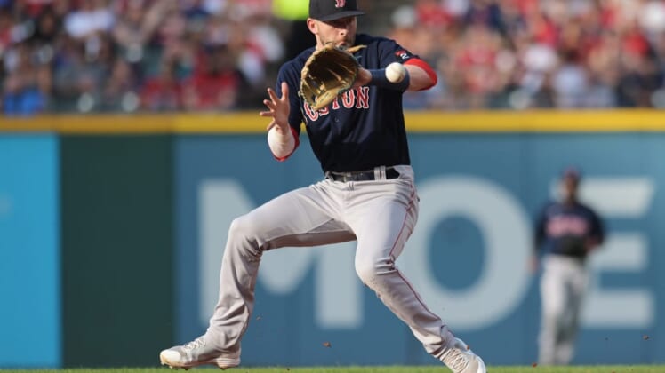 Jun 25, 2022; Cleveland, Ohio, USA; Boston Red Sox second baseman Trevor Story (10) fields a ball hit by Cleveland Guardians first baseman Owen Miller (not pictured) during the fourth inning at Progressive Field. Mandatory Credit: Ken Blaze-USA TODAY Sports