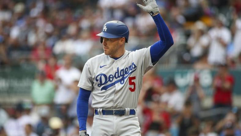 Jun 25, 2022; Atlanta, Georgia, USA; Los Angeles Dodgers first baseman Freddie Freeman (5) acknowledges the crowd before an at bat against the Atlanta Braves in the first inning at Truist Park. Mandatory Credit: Brett Davis-USA TODAY Sports