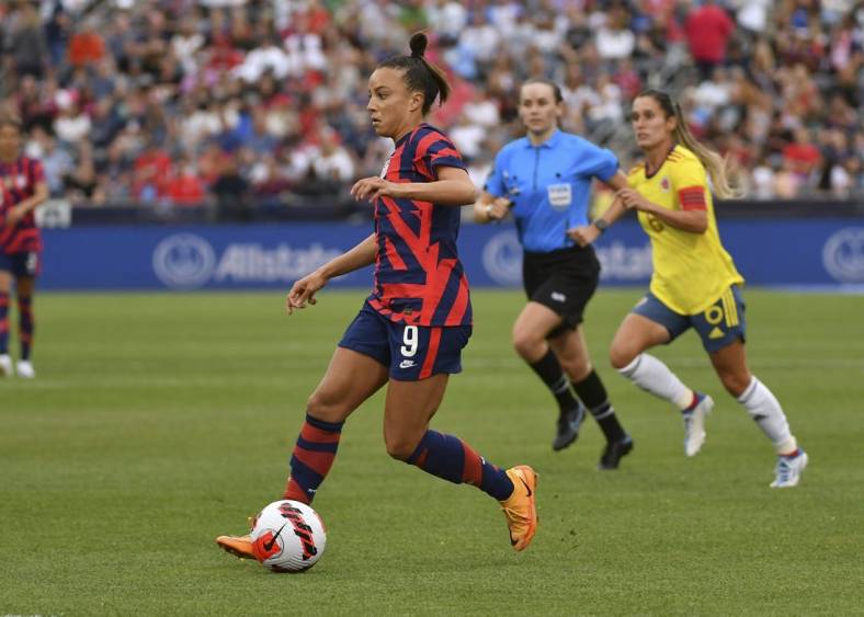 Jun 25, 2022; Commerce City, Colorado, USA; USA forward Mallory Pugh (9) brings the ball up field against Colombia during an international friendly soccer match at Dick's Sporting Goods Park. Mandatory Credit: John Leyba-USA TODAY Sports