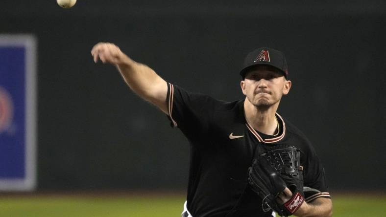 Jun 25, 2022; Phoenix, Arizona, USA; Arizona Diamondbacks starting pitcher Zach Davies (27) throws against the Detroit Tigers in the first inning at Chase Field. Mandatory Credit: Rick Scuteri-USA TODAY Sports