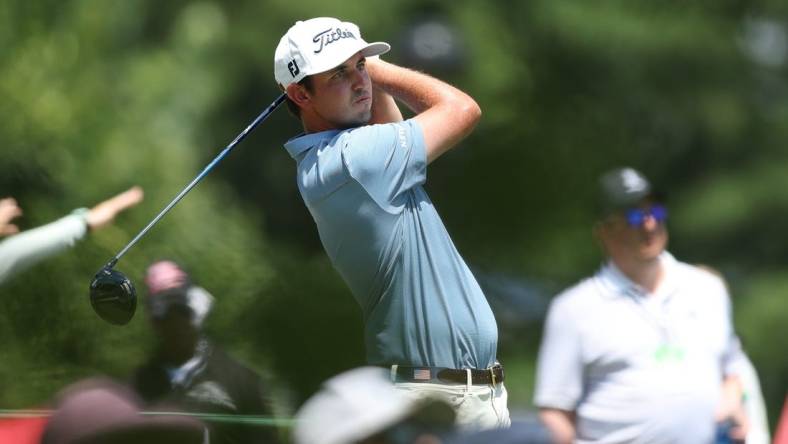 Jun 26, 2022; Cromwell, Connecticut, USA; J.T. Poston plays a shot from the first tee during the final round of the Travelers Championship golf tournament. Mandatory Credit: Vincent Carchietta-USA TODAY Sports