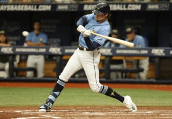 Jun 26, 2022; St. Petersburg, Florida, USA;  Tampa Bay Rays center fielder Josh Lowe (15) singles during the third inning against the Pittsburgh Pirates at Tropicana Field. Mandatory Credit: Kim Klement-USA TODAY Sports