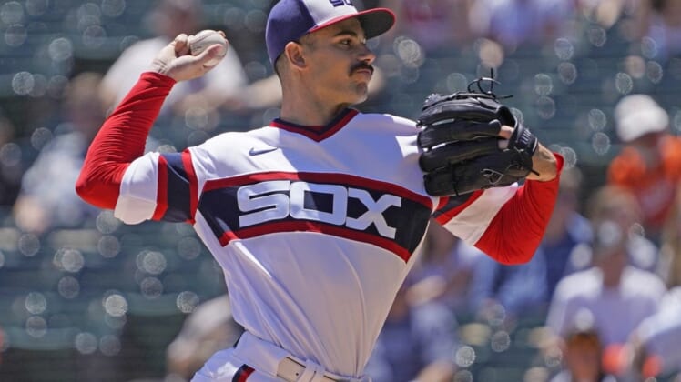 Jun 26, 2022; Chicago, Illinois, USA; Chicago White Sox starting pitcher Dylan Cease (84) throws the ball against the Baltimore Orioles during the first inning at Guaranteed Rate Field. Mandatory Credit: David Banks-USA TODAY Sports