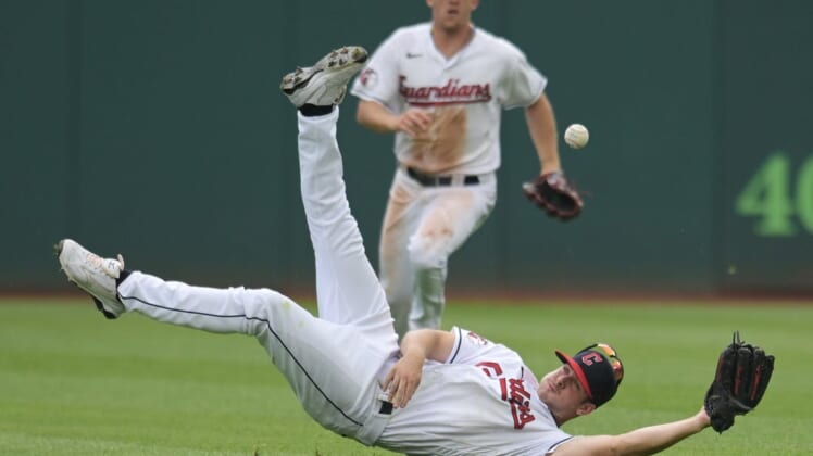 Jun 26, 2022; Cleveland, Ohio, USA; Cleveland Guardians left fielder Ernie Clement (28) dives for an RBI single hit by Boston Red Sox second baseman Trevor Story (not pictured) during the sixth inning at Progressive Field. Mandatory Credit: Ken Blaze-USA TODAY Sports