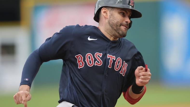 Jun 26, 2022; Cleveland, Ohio, USA; Boston Red Sox designated hitter J.D. Martinez (28) advances to third on a single by left fielder Alex Verdugo (not pictured) during the sixth inning against the Cleveland Guardians at Progressive Field. Mandatory Credit: Ken Blaze-USA TODAY Sports