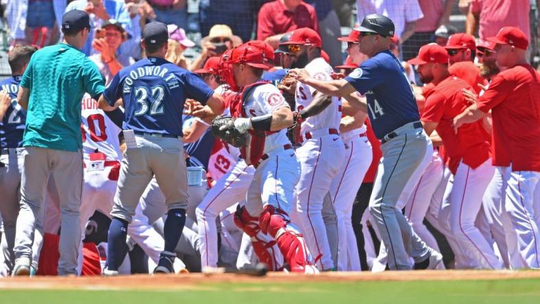 Jun 26, 2022; Anaheim, California, USA;  The Los Angeles Angels and Seattle Mariners cleared the benched during a brawl in the second inning at Angel Stadium. Mandatory Credit: Jayne Kamin-Oncea-USA TODAY Sports