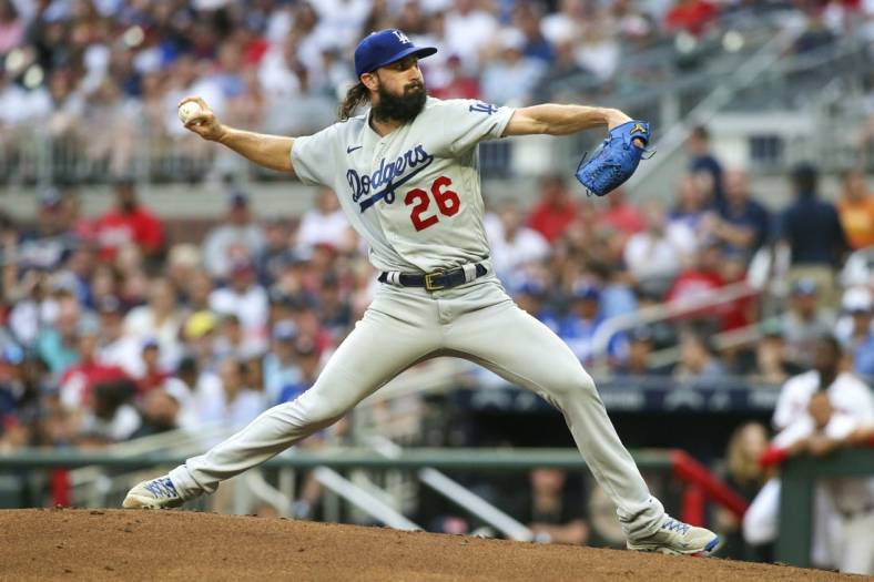 Jun 26, 2022; Atlanta, Georgia, USA; Los Angeles Dodgers starting pitcher Tony Gonsolin (26) throws against the Atlanta Braves in the first inning at Truist Park. Mandatory Credit: Brett Davis-USA TODAY Sports