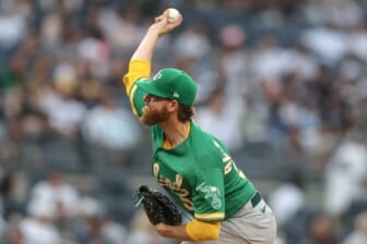 Jun 27, 2022; Bronx, New York, USA; Oakland Athletics starting pitcher Paul Blackburn (58) delivers a pitch against the New York Yankees during the first inning at Yankee Stadium. Mandatory Credit: Vincent Carchietta-USA TODAY Sports