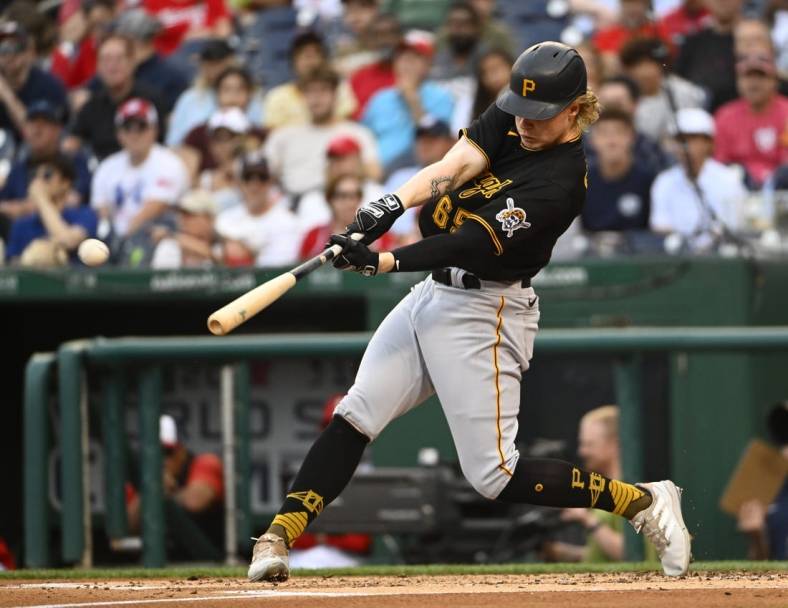 Jun 27, 2022; Washington, District of Columbia, USA; Pittsburgh Pirates left fielder Jack Suwinski (65) hits a double against the Washington Nationals during the second inning at Nationals Park. Mandatory Credit: Brad Mills-USA TODAY Sports