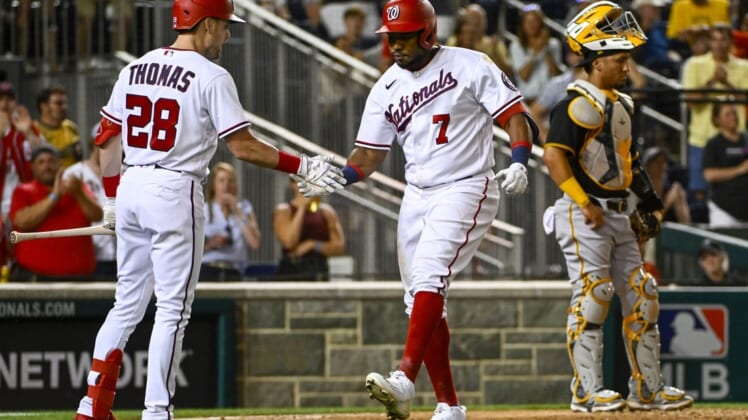 Jun 27, 2022; Washington, District of Columbia, USA; Washington Nationals third baseman Maikel Franco (7) is congratulated by left fielder Lane Thomas (28) after hitting a two run home run against the Pittsburgh Pirates during the eighth inning at Nationals Park. Mandatory Credit: Brad Mills-USA TODAY Sports