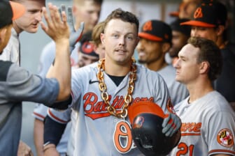 Jun 27, 2022; Seattle, Washington, USA; Baltimore Orioles first baseman Ryan Mountcastle (6) celebrates in the dugout after hitting a solo-home run against the Seattle Mariners during the third inning at T-Mobile Park. Mandatory Credit: Joe Nicholson-USA TODAY Sports