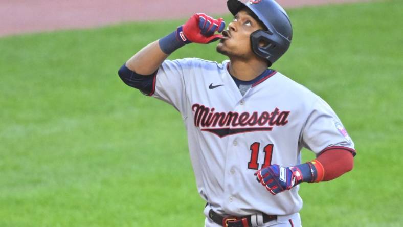 Jun 28, 2022; Cleveland, Ohio, USA; Minnesota Twins second baseman Jorge Polanco (11) celebrates his two-run home run in the third inning against the Cleveland Guardians at Progressive Field. Mandatory Credit: David Richard-USA TODAY Sports