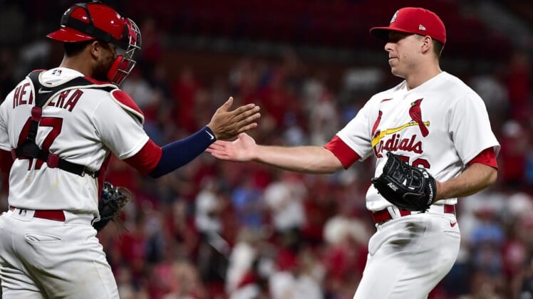 Jun 28, 2022; St. Louis, Missouri, USA;  St. Louis Cardinals relief pitcher Ryan Helsley (56) celebrates with catcher Ivan Herrera (47) after the Cardinals defeated the Miami Marlins at Busch Stadium. Mandatory Credit: Jeff Curry-USA TODAY Sports
