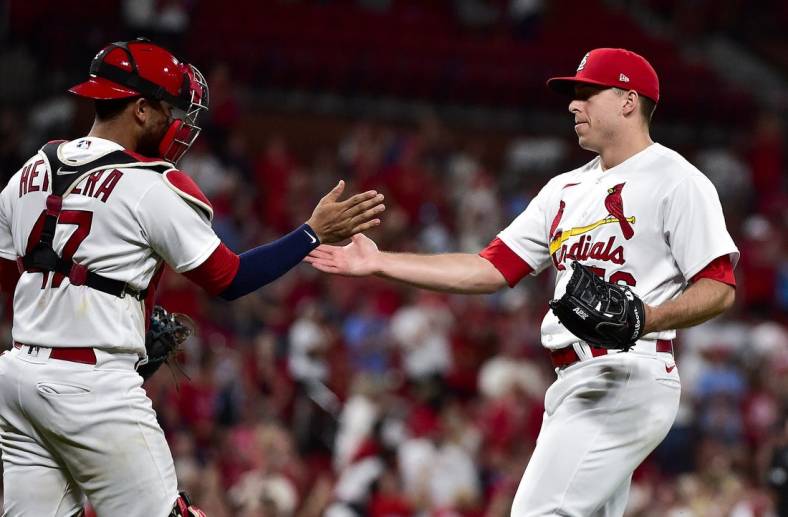 Jun 28, 2022; St. Louis, Missouri, USA;  St. Louis Cardinals relief pitcher Ryan Helsley (56) celebrates with catcher Ivan Herrera (47) after the Cardinals defeated the Miami Marlins at Busch Stadium. Mandatory Credit: Jeff Curry-USA TODAY Sports