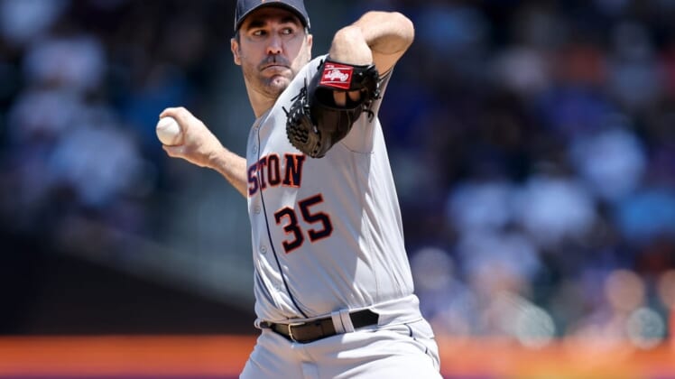 Jun 29, 2022; New York City, New York, USA; Houston Astros starting pitcher Justin Verlander (35) pitches against the New York Mets during the first inning at Citi Field. Mandatory Credit: Brad Penner-USA TODAY Sports