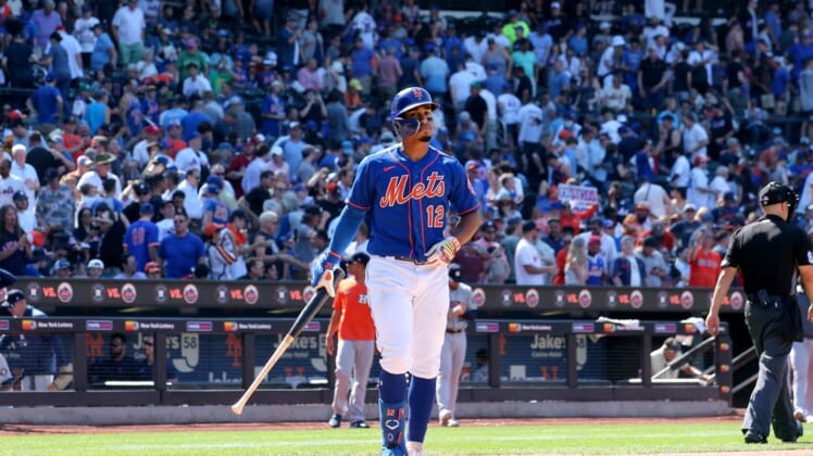 Jun 29, 2022; New York City, New York, USA; New York Mets shortstop Francisco Lindor (12) reacts as he walks off the field after striking out to end the game against the Houston Astros at Citi Field. Mandatory Credit: Brad Penner-USA TODAY Sports