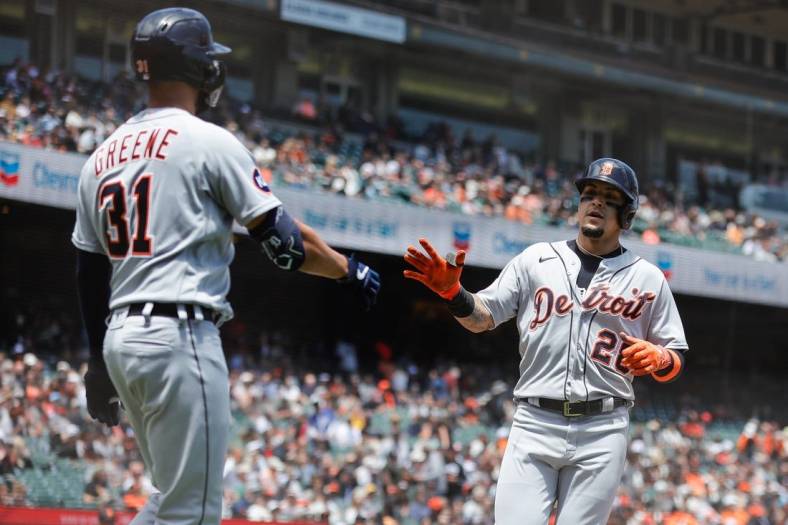 Jun 29, 2022; San Francisco, California, USA; Detroit Tigers shortstop Javier Baez (28) celebrates with center fielder Riley Greene (31) after scoring a run during the fourth inning against the San Francisco Giants at Oracle Park. Mandatory Credit: Sergio Estrada-USA TODAY Sports