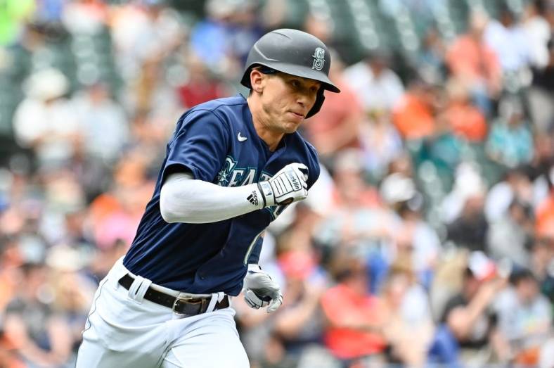 Jun 29, 2022; Seattle, Washington, USA; Seattle Mariners right fielder Sam Haggerty (0) runs towards first base after hitting a RBI double against the Baltimore Orioles during the fourth inning at T-Mobile Park. Mandatory Credit: Steven Bisig-USA TODAY Sports