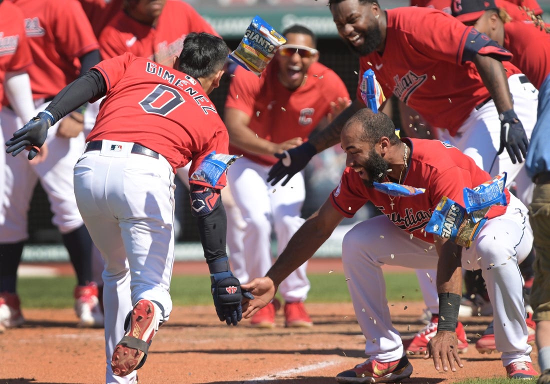 Jun 30, 2022; Cleveland, Ohio, USA; Cleveland Guardians shortstop Amed Rosario (1) celebrates with second baseman Andres Gimenez (0) after Gimenez hit a game winning two run home run during the ninth inning against the Minnesota Twins at Progressive Field. Mandatory Credit: Ken Blaze-USA TODAY Sports