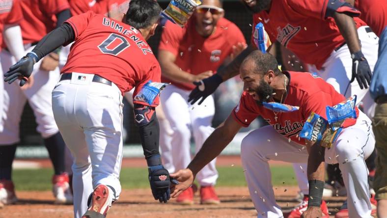 Jun 30, 2022; Cleveland, Ohio, USA; Cleveland Guardians shortstop Amed Rosario (1) celebrates with second baseman Andres Gimenez (0) after Gimenez hit a game winning two run home run during the ninth inning against the Minnesota Twins at Progressive Field. Mandatory Credit: Ken Blaze-USA TODAY Sports