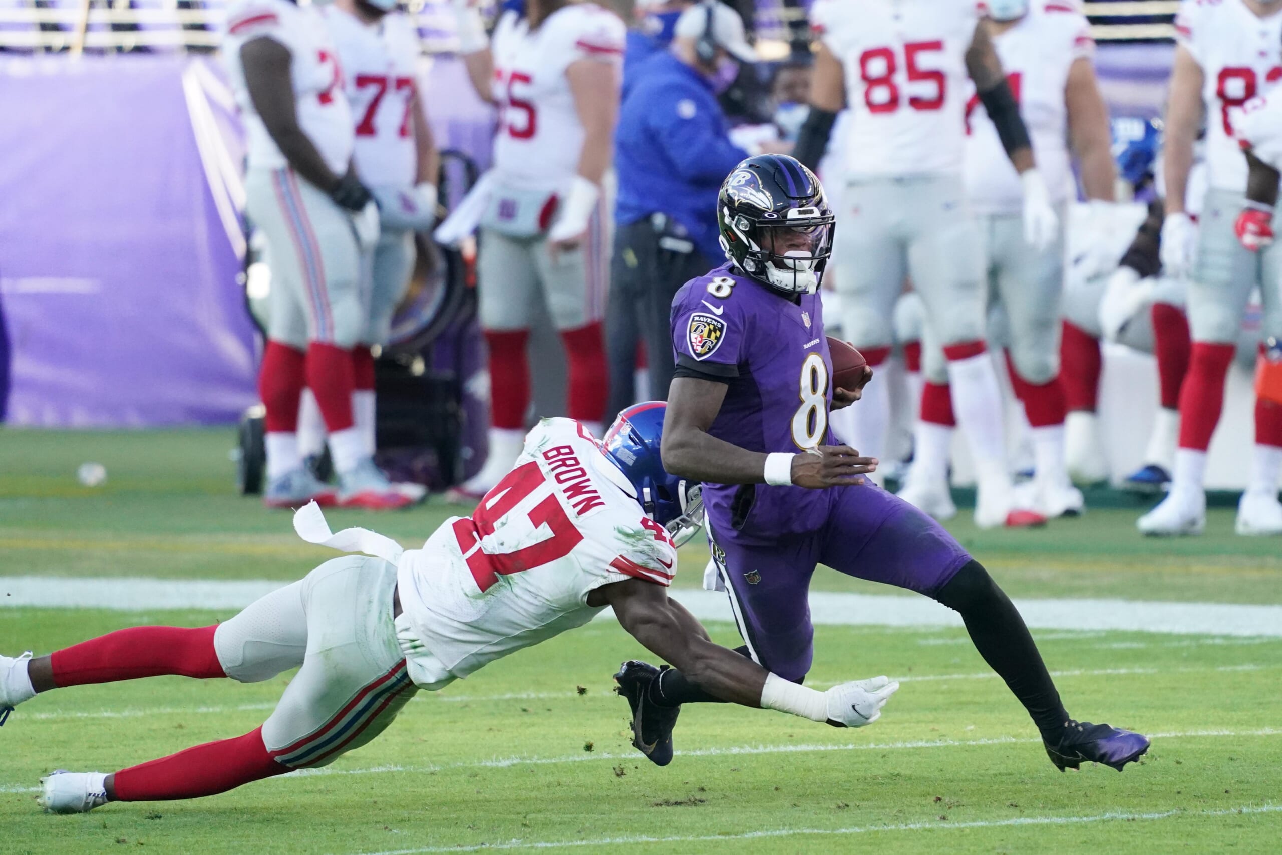 Lamar Jackson at voluntary practice for Ravens after skipping last year's